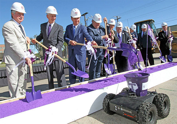 Purple Colored Sand in White Ground Breaking Display Boxes