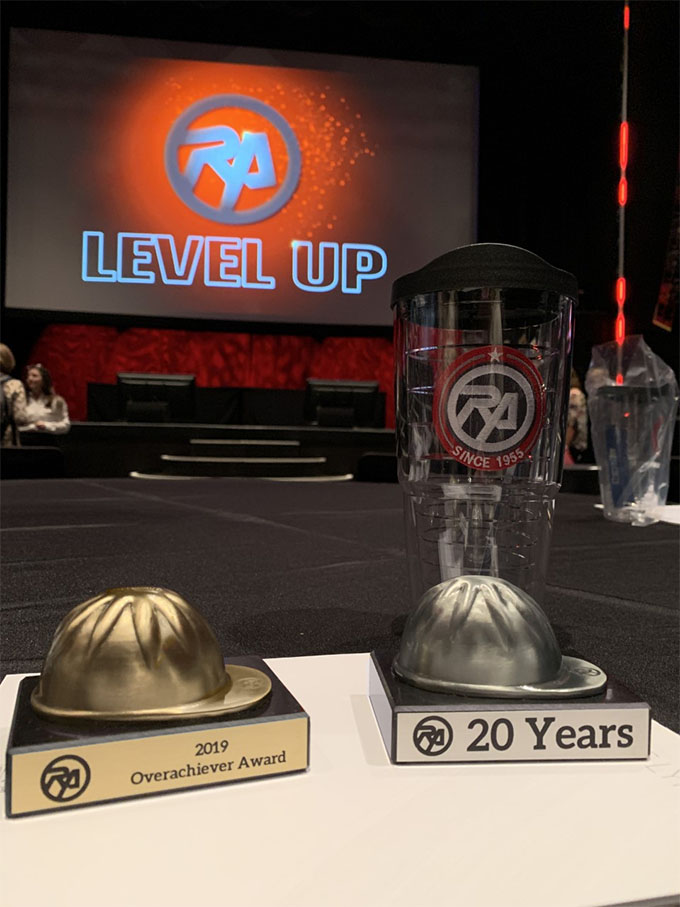 Brass and Tin Hard Hats on Black Marble Bases