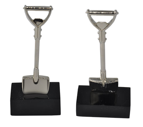 Bright Silver Shovel on Black Base